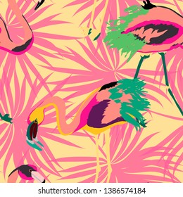 Pink flamingo with tropical leaves floral seamless pattern. Palm tree leaves with exotic birds. Flamingo floral background textile design. Great print for swimsuits.