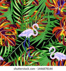 Pink flamingo with tropical leaves floral seamless pattern. Palm tree leaves with exotic birds. Flamingo floral background textile design.