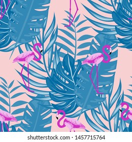 Pink flamingo with tropical leaves floral seamless pattern. Palm tree leaves with exotic birds. Flamingo floral background textile design.