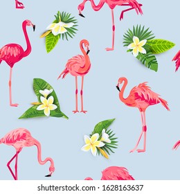 Pink flamingos, jungle leaves and tropical flowers plumeria seamless pattern. Vector illustration.