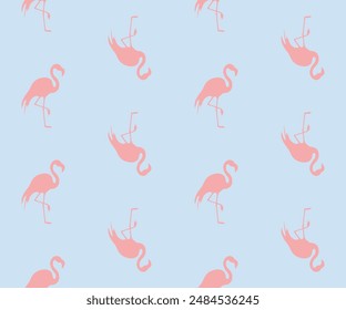 Pink flamingos. Seamless pattern. Bird silhouettes on a bluebackground.