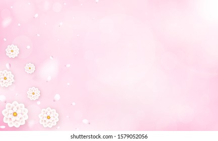 Pink floral spring background on pastel colors. Light flowers with falling white spotted petals. Beauty concept with bokeh, sunshine and gradient effects. Copy space for the text. 