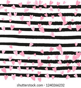 Pink glitter hearts confetti  on black stripes. Falling sequins with glossy sparkles. Design with pink glitter hearts for greeting card, bridal shower and save the date invite.