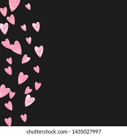 Pink glitter hearts confetti on isolated backdrop. Shiny random sequins with metallic sparkles. Design with pink glitter hearts for party invitation, banner, greeting card, bridal shower.