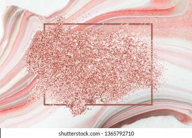 Pink gold glitter with a brownish red rhombus frame on a pastel pink fluid patterned background vector
