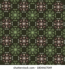Motivos rosas y verdes sobre el fondo de la oliva oscura