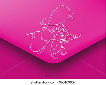 Pink greeting envelope on Valentines day lettering love is in the air, I love you