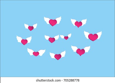 Pink heart with flying wings Many hearts fly in a circle.