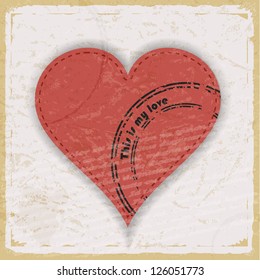 Pink heart with print on a vintage background