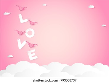 pink heart shape with wings and love word  over cloud vector background, love and valentine day concept, space for text or message design