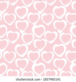 Pink Heart shaped brush stroke seamless pattern background for fashion textiles, graphics