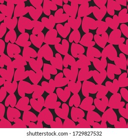 Pink Heart shaped Valentine’s Day seamless pattern background for fashion textiles, graphics