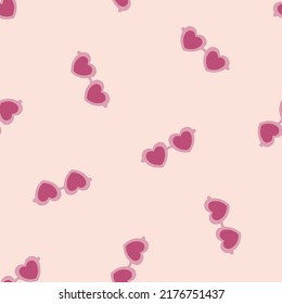 Pink heart sunglasses seamless pattern.