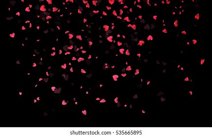 Pink hearts petals falling on black background for Saint Valentine Day greeting card design. Flower petal in shape of heart confetti