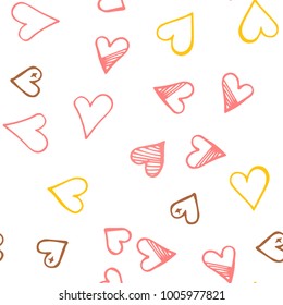 Pink hearts seamless pattern. Scattered little yellow, brown, rose love symbol.  Endlessly repeating fall sketch heart shape on white valentine background. Hand drawing texture. Vector illustration.