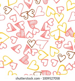 Pink hearts seamless pattern. Scattered little yellow, brown, rose love symbol.  Endlessly repeating fall sketch heart shape on white valentine background. Hand drawing texture. Vector illustration.