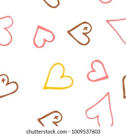 Pink hearts seamless pattern. Scattered little yellow, brown, rose love symbol.  Endlessly repeating fall sketch heart shape on white valentine background. Hand drawing texture. Vector illustration.
