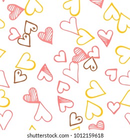Pink hearts seamless pattern. Scattered little yellow, brown, rose love symbol.  Endlessly repeating fall sketch heart shape on white valentine background. Hand drawing texture. Vector illustration.