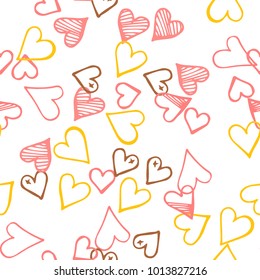 Pink hearts seamless pattern. Scattered little yellow, brown, rose love symbol.  Endlessly repeating fall sketch heart shape on white valentine background. Hand drawing texture. Vector illustration.