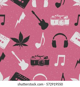 Pink Hippie seamless pattern with marijuana leaves, headphones, old camera, heart, music note, guitar, cassette records. Wrapping paper. Vector illustration