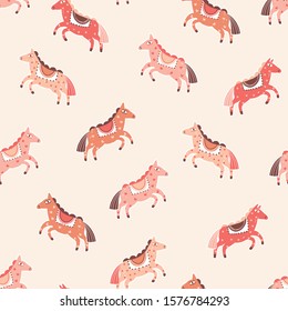 Pink horses vector seamless pattern. Cartoon pony character on peach color background. Abstract carnival childish backdrop. Magical hand drawn cute animal wrapping paper, wallpaper design.