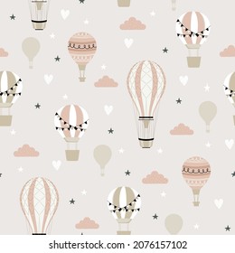 Pink hot air ballon and clouds seamless childish pattern. Hand drawn repeat pattern for wrapping, fabrik, textile or paper projects. Vector illustration.   