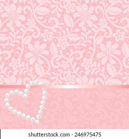 Pink lace background with pearls shaped heart