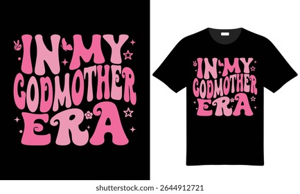 Pink and light pink retro style text on a black tshirt InMyGodmotherEra with small graphic elements