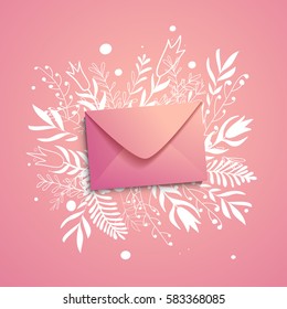 Pink mailing envelope on floral background.