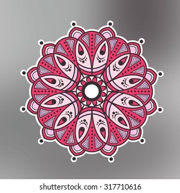 Pink mandala sticker on gray blurred background