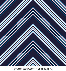 Pink and navy Chevron diagonal striped seamless pattern background suitable for fashion textiles, graphics