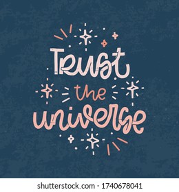 Pink and navy vintage t-shirt iron on design with Trust the universe quote, twinkle stars and burst lines. Retro script art with motivational message about destiny and creativity. 