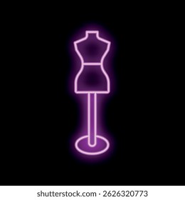 Sinal de néon rosa representando um manequim de costureiro sobre um fundo preto
