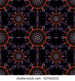 Pink, neutral and yellow ornament on a black background. Seamless background. Wallpaper baroque, damask. Floral seamless pattern.