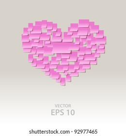 Pink it notes shaped into heart on v-day