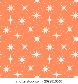 Patrón transparente rosa y naranja con estrellas.