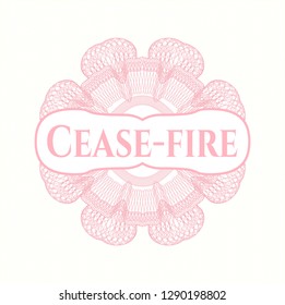 Pink passport style rosette with text Cease-fire inside