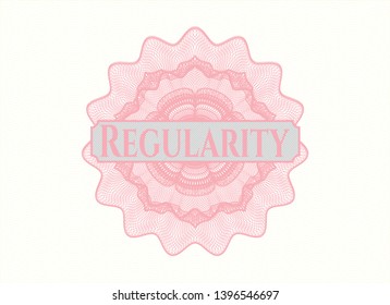 Pink passport style rosette with text Regularity inside