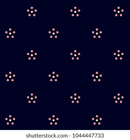 Pink pattern ultramarine background. Vector seamless ornament. Simple floral geometric design. Dot flowers on a indigo all over print. Decorative fabric cloth, home textile, wallpaper printing block.