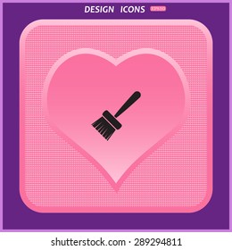 Pink plastic button with a heart on a purple background.