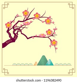 Pink plum blossom in front of the mountain.