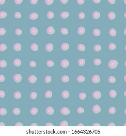 pink polka dots seamless vector pattern on blue