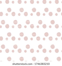 Pink polka dots of various sizes cheerful on a white background, handmade, textured. Seamless vector pattern. For textiles, surface packaging, packaging design.