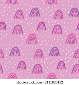 pink and purple boho rainbows seamless pattern with rain on pink plush background. Great for baby nursery, kids room, fabric and baby shower 