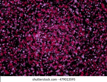 Pink and purple star confetti background. Festive texture on black background.