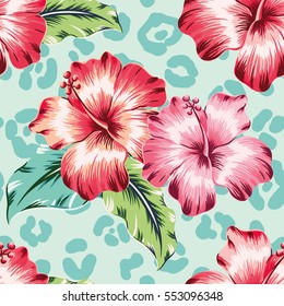 Pink and red hibiscuses with green leaves on the leopard skin print background. Vector seamless pattern with tropical flowers.
