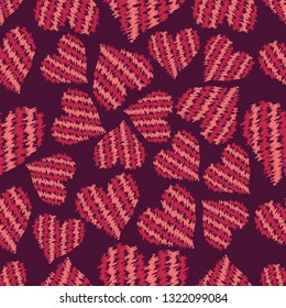 Pink, red scribble hearts seamless pattern on dark background. Vector illustration for design textile, wrapping paper, card, banner, wallpaper