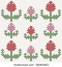 Pink and red tulips, imitation of cross-stitch. Vector illustration