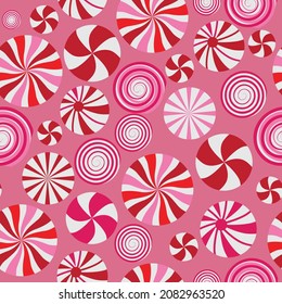 Pink, red, and white seamless repeating pattern. Candy mints holiday theme vector illustration background.