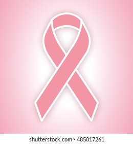 Pink ribbon on pink background